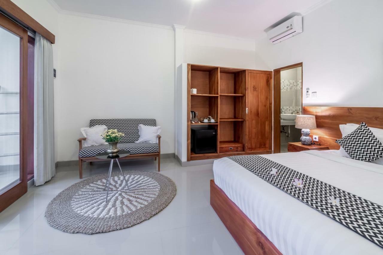 Hotel Puri Uma Ratu By Rpm Seminyak Exterior foto